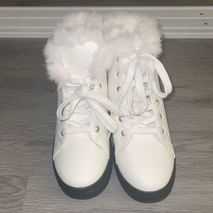 white leather (faux) snow boots with faux fur lining.